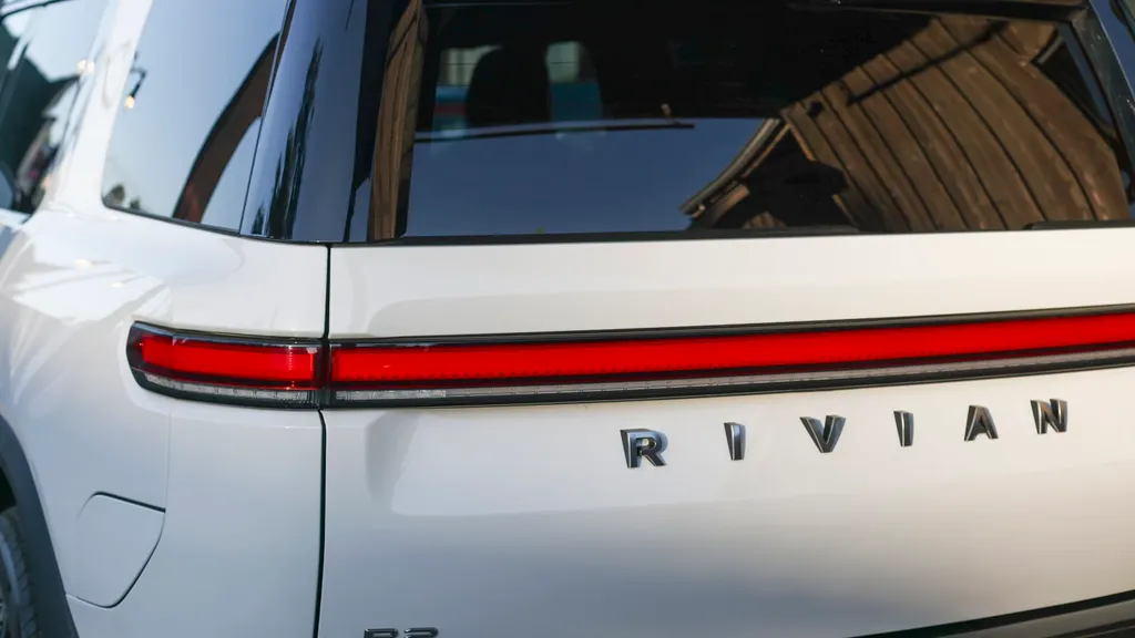 Rivian cuts 2026 spending forecast and narrows loss guidance