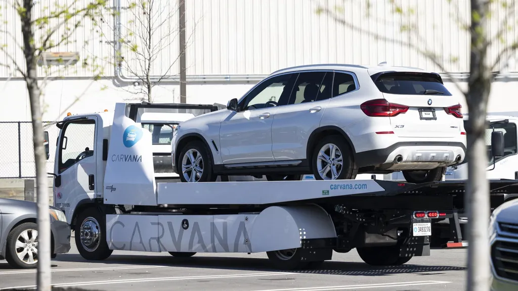 BMW cuts profit outlook after China slowdown, Iran war