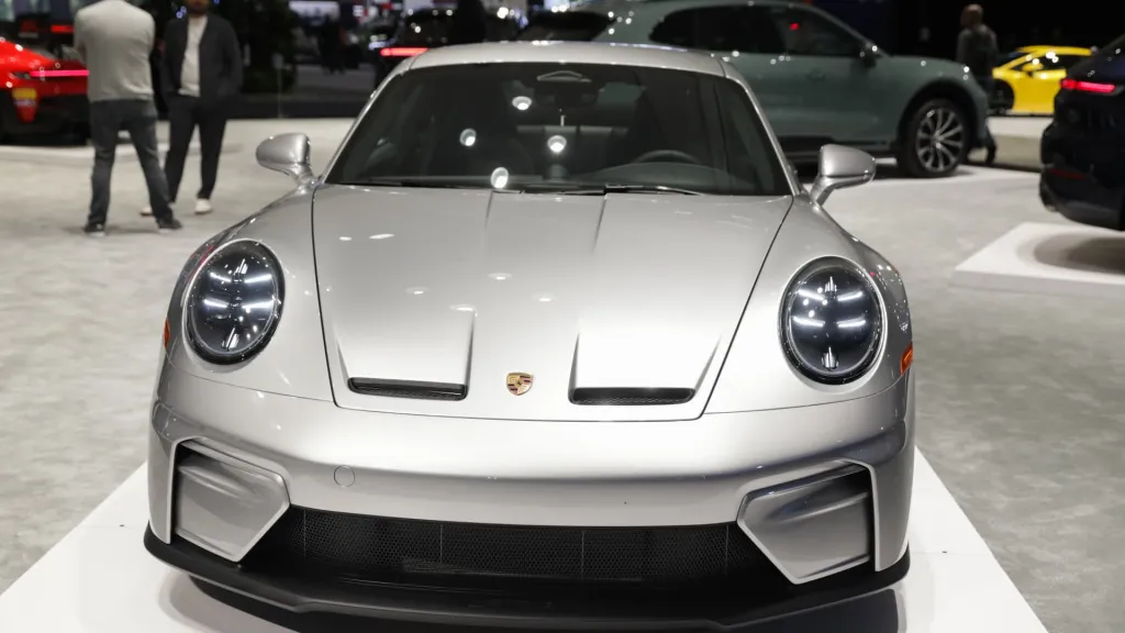 Porsche signs $1.5bn AI deal and agrees to sell MHP to TCS